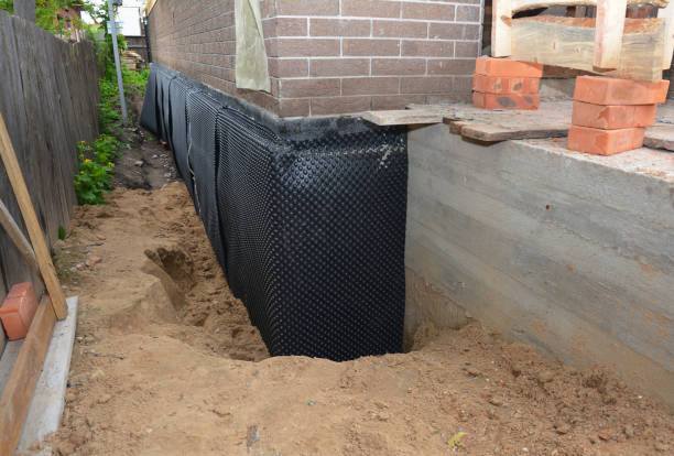 Happy homeowners after waterproofing job in Buffalo Valley